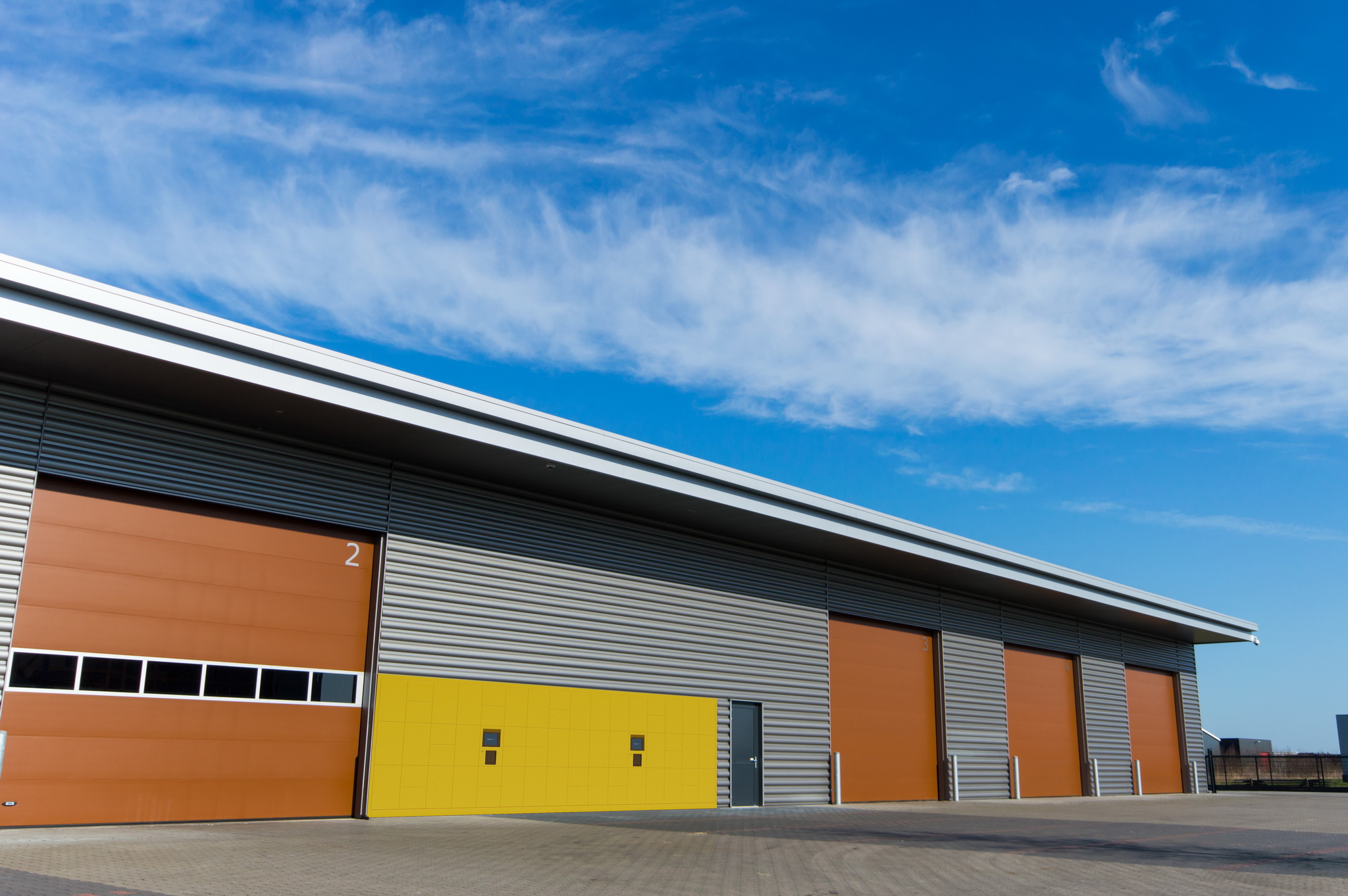 new storage warehouse with brown doors